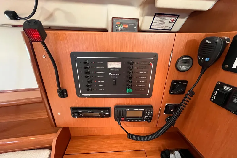 Slide: The Image of Control panel of a 2008 Beneteau Oceanis 343 sailboat with communication equipment. - 31