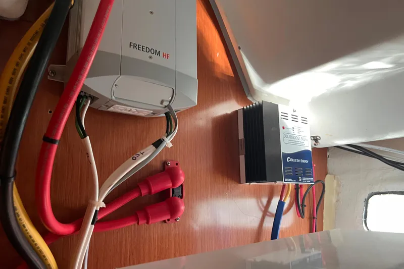 Slide: The Image of Electrical system inside a 2008 Beneteau Oceanis 343 sailboat, featuring Freedom HF inverter. - 66