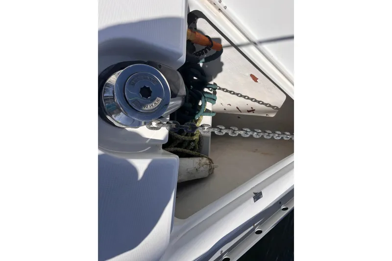 Slide: The Image of Anchor chain and winch on 2008 Beneteau Oceanis 343 sailboat deck. - 71