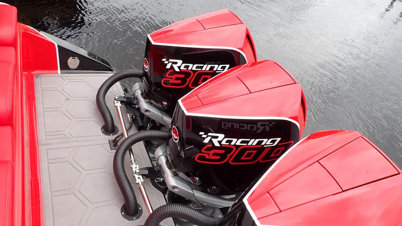 Slide: The Image of 2024 Statement 350 Open boat with dual Racing 300 engines on water. - 19