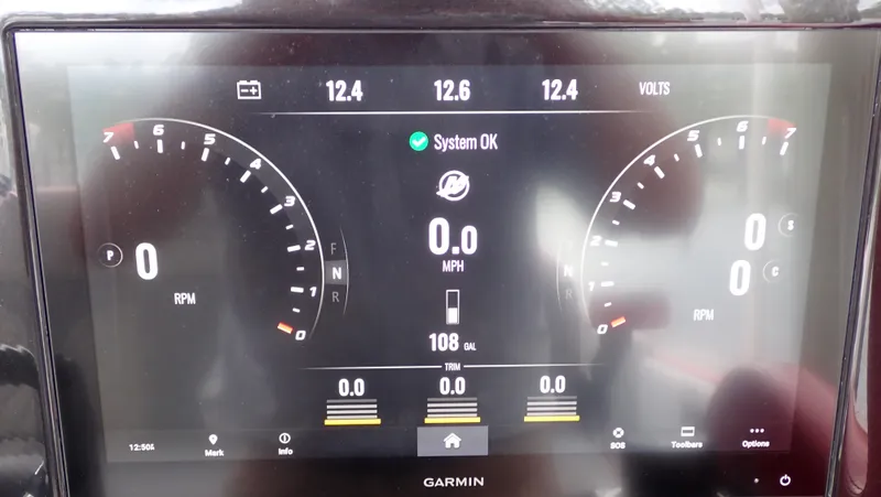 Slide: The Image of Garmin dashboard display on 2024 Statement 350 Open, showing RPM, speed, and system status. - 25