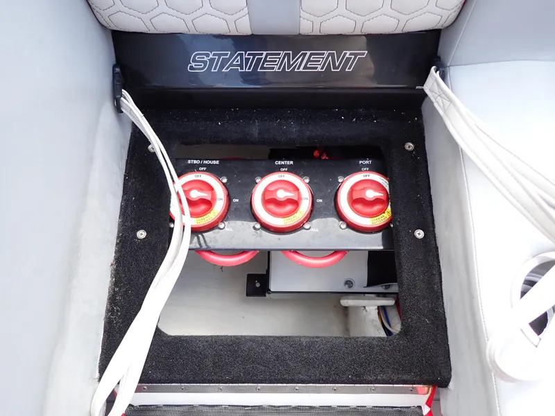 Slide: The Image of 2024 Statement 350 Open boat battery switches and wiring compartment. - 28