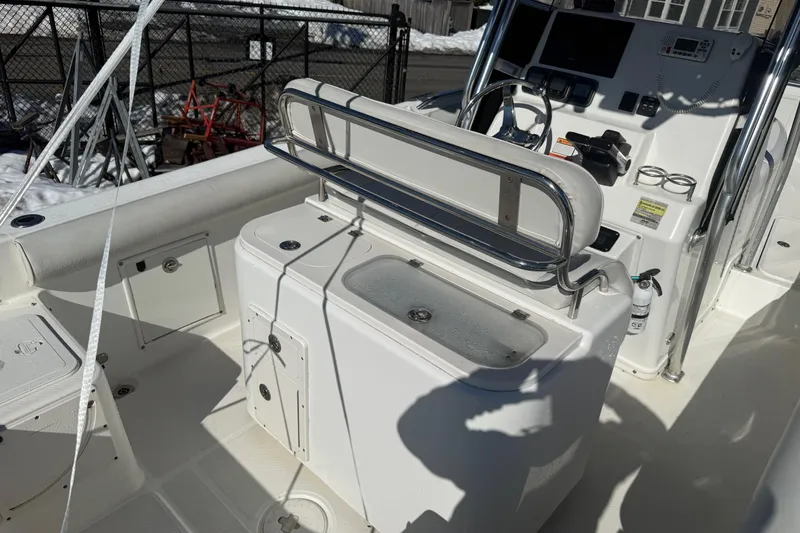 Slide: The Image of 2008 Century 2400 Center Console boat interior with helm and seating area. - 18