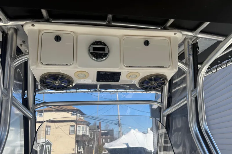 Slide: The Image of 2008 Century 2400 Center Console boat with overhead console and speakers. - 30