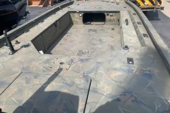 Slide: The Image of 2017 Tracker Grizzly 1548 MVX Sportsman boat with camouflage interior design. - 3