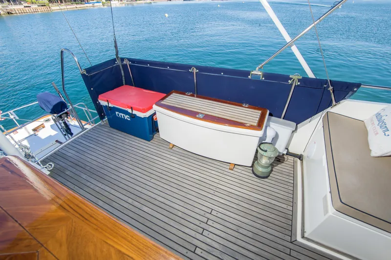 Slide: The Image of Deck of 1995 Grand Banks 42 Classic yacht with seating and storage. - 19