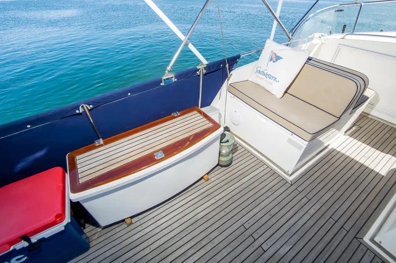 Slide: The Image of Deck seating area on a 1995 Grand Banks 42 Classic yacht with ocean view. - 20
