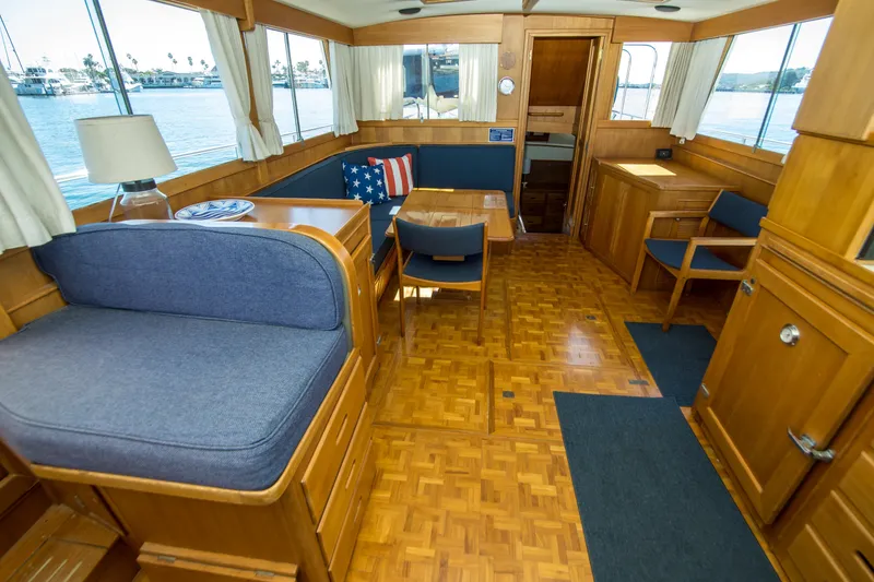 Slide: The Image of Interior of 1995 Grand Banks 42 Classic yacht with wooden furnishings and nautical decor. - 28