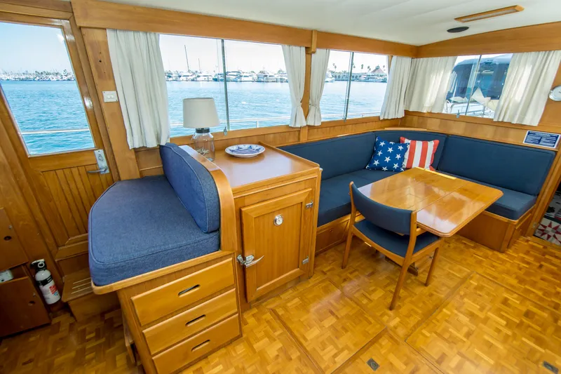 Slide: The Image of Interior of 1995 Grand Banks 42 Classic yacht with wooden furnishings and nautical decor. - 30