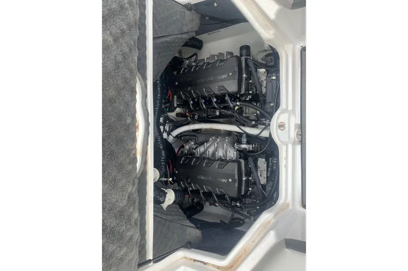 Slide: The Image of 2019 Yamaha AR240 boat engine compartment with twin high output engines. - 22