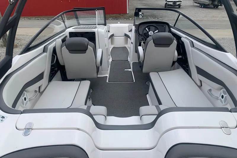 Slide: The Image of 2019 Yamaha Boats AR240 interior with spacious seating and modern design. - 7
