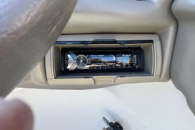 Slide: The Image of Sony stereo system in a 2006 Crownline 270 BR boat dashboard. - 17