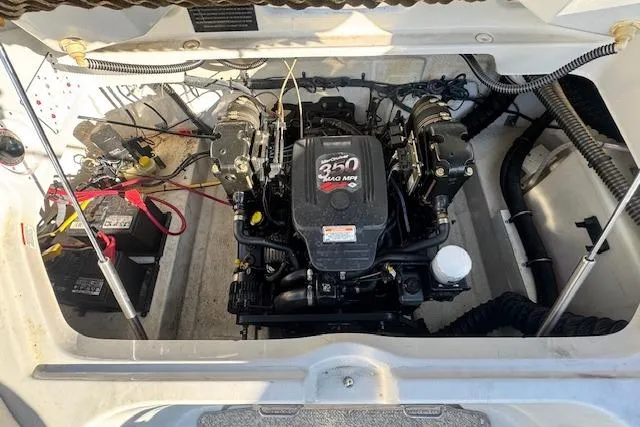 Slide: The Image of 2006 Crownline 270 BR engine compartment with 350 MAG MPI engine and dual batteries. - 7