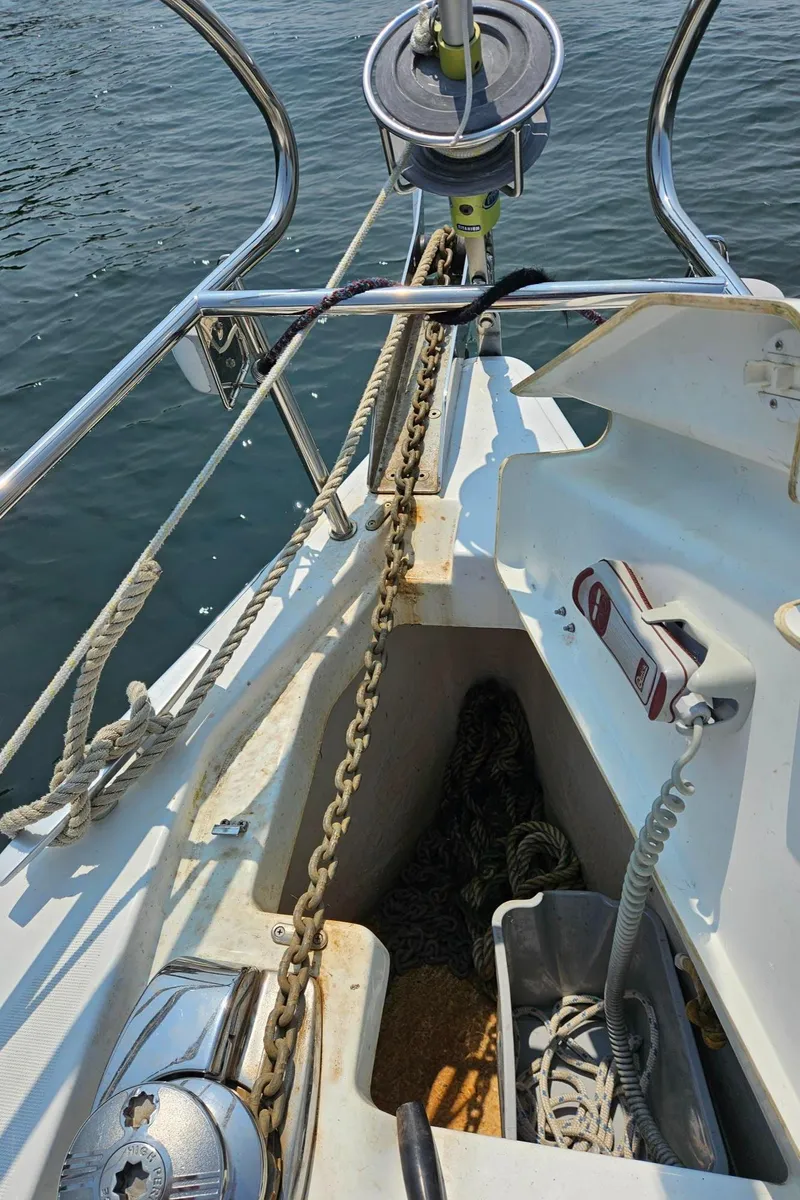 Slide: The Image of Beneteau Oceanis 37 sailboat deck with anchor chain and ropes, 2012 model. - 13