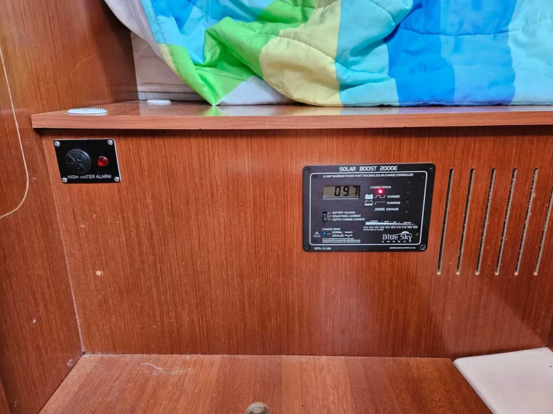 Slide: The Image of Control panel on 2012 Beneteau Oceanis 37 yacht with solar charge controller and high water alarm. - 29