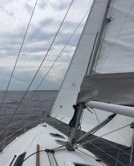 Slide: The Image of Beneteau Oceanis 37 sailing on open water under cloudy skies, 2012 model. - 3