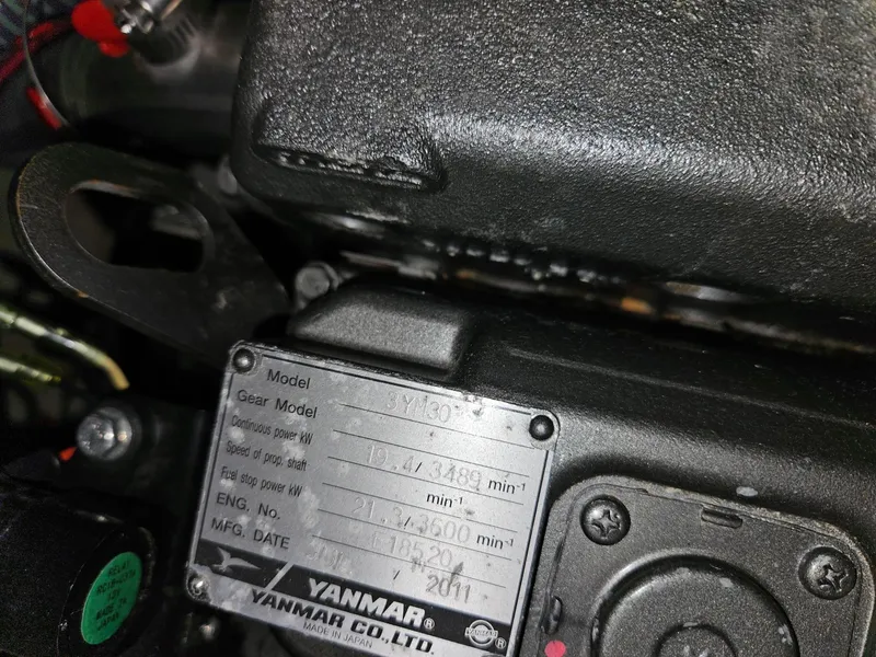 Slide: The Image of Yanmar engine plate on a 2012 Beneteau Oceanis 37 sailboat. - 32