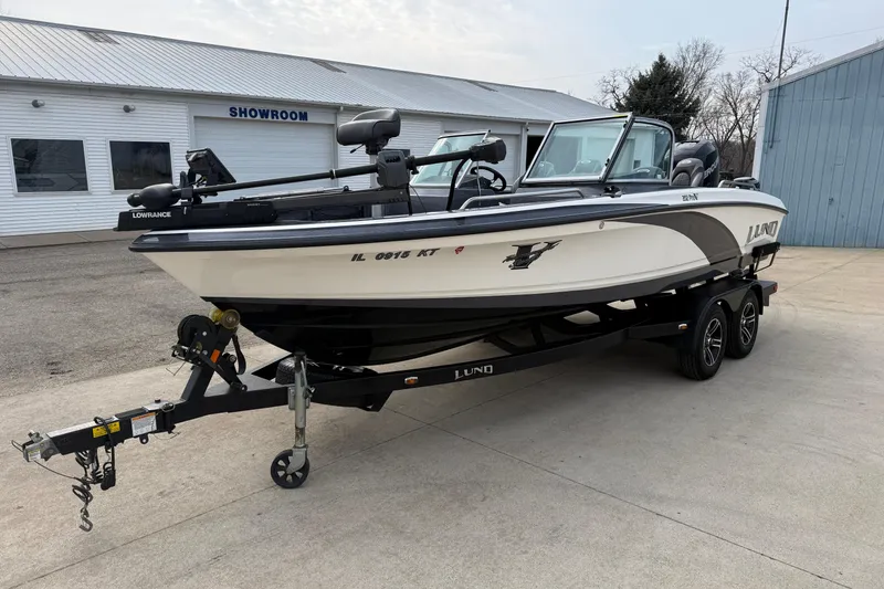 Slide: The Image of 2015 Lund 202 Pro-V GL boat on trailer outside showroom. - 4