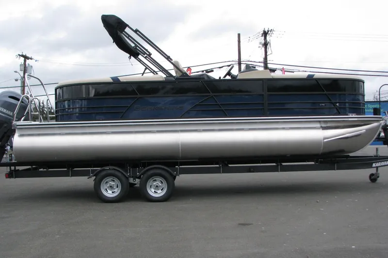 The Image of 2026 Berkshire 24 E CTS pontoon boat on trailer, side view. - 0