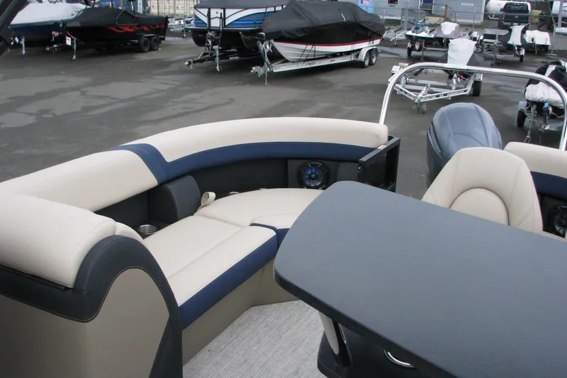Slide: The Image of 2026 Berkshire 24 E CTS pontoon boat interior with seating and table. - 14