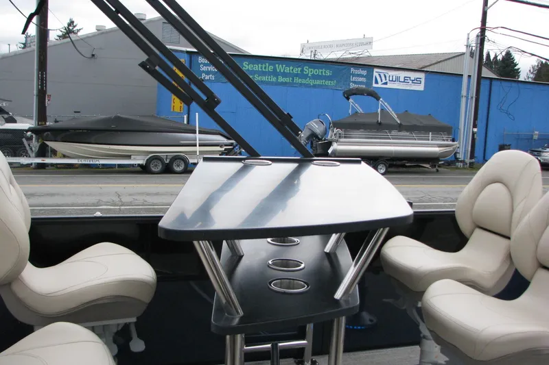 Slide: The Image of Interior of 2026 Berkshire 24 E CTS pontoon boat with seating and table. - 9