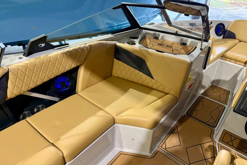 Slide: The Image of Luxurious interior of 2023 Tigé Z5 boat with tan quilted seating and modern design. - 16