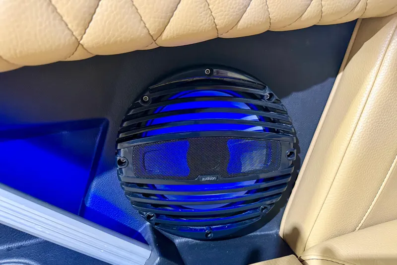 Slide: The Image of Speaker with blue LED lighting in 2023 Tigé Z5 boat interior. - 27
