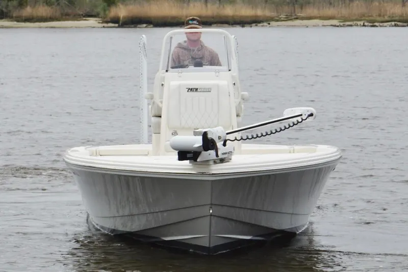 Slide: The Image of 2023 Pathfinder 2500 Hybrid boat on water, front view, with trolling motor. - 7
