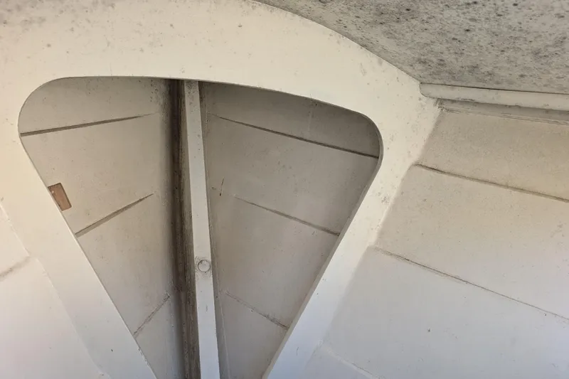 Slide: The Image of Interior view of a 1998 Belkov skiff, showcasing structural details and design. - 19