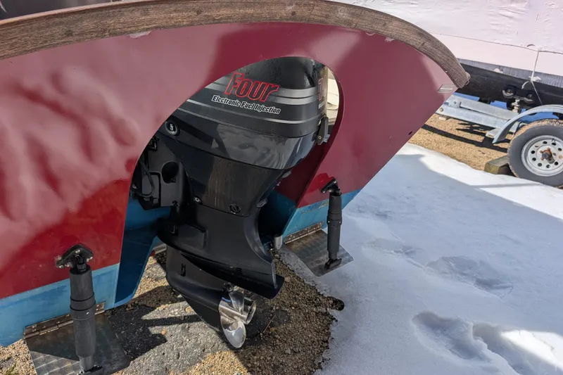 Slide: The Image of 1998 Belkov skiff with outboard motor on snowy ground. - 21