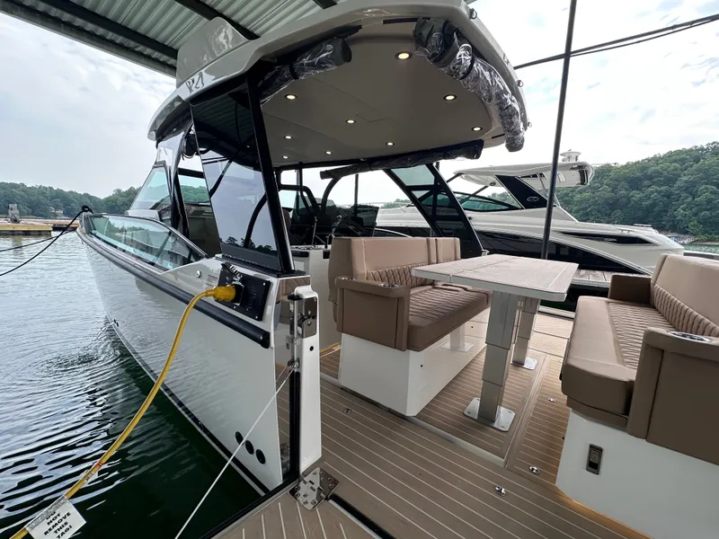 Slide: The Image of The image shows a 2027 Saxdor 320 GTO with sleek, modern design and a spacious seating area. - 9
