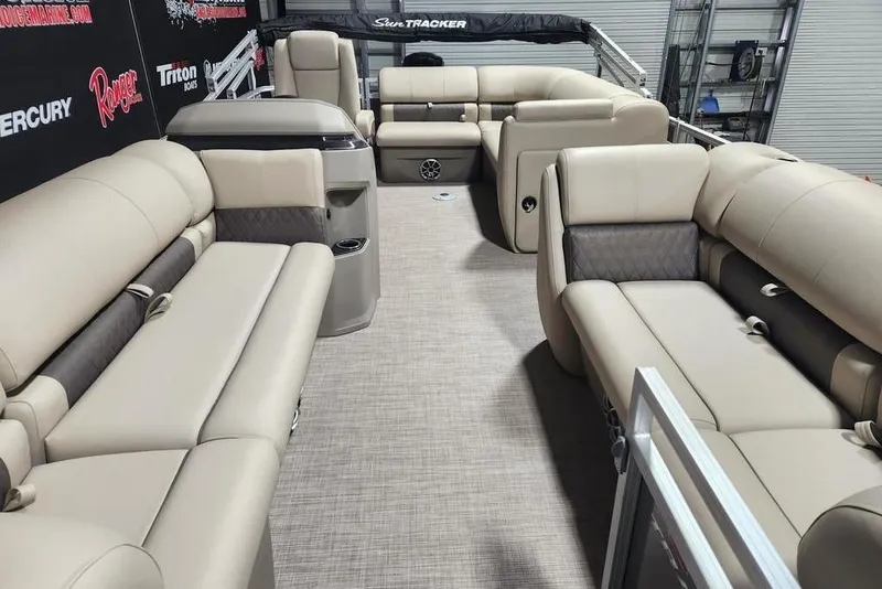 Slide: The Image of 2025 Sun Tracker Party Barge 20 DLX interior with spacious seating and modern design. - 8