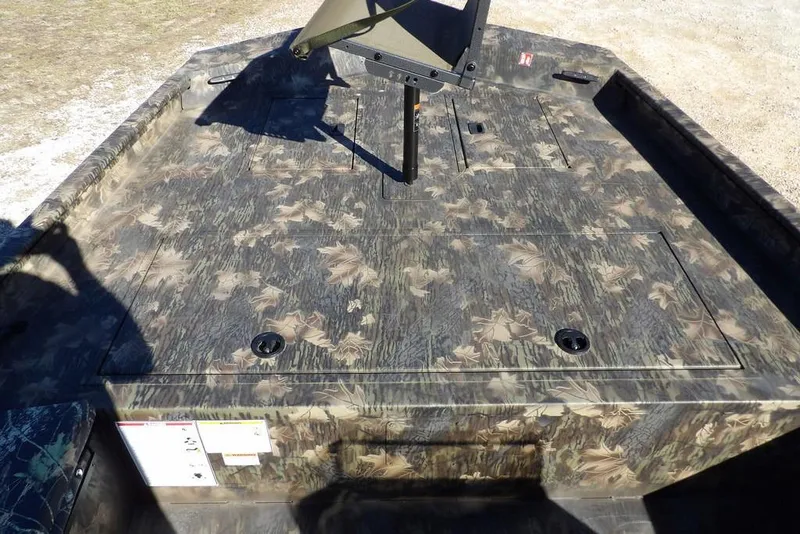 Slide: The Image of 2026 Crestliner 2070 Retriever SCHD boat with camouflage deck design. - 28