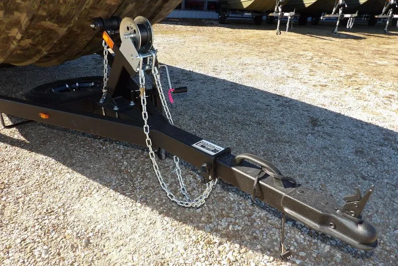 Slide: The Image of Trailer hitch of 2026 Crestliner 2070 Retriever SCHD on gravel surface. - 39