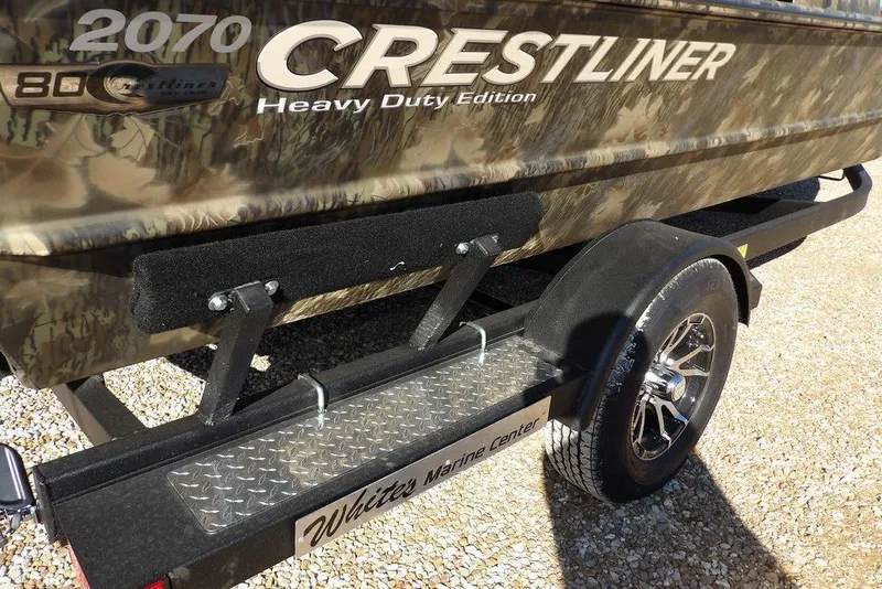 Slide: The Image of 2026 Crestliner 2070 Retriever SCHD boat on trailer, camo design, heavy-duty edition. - 42