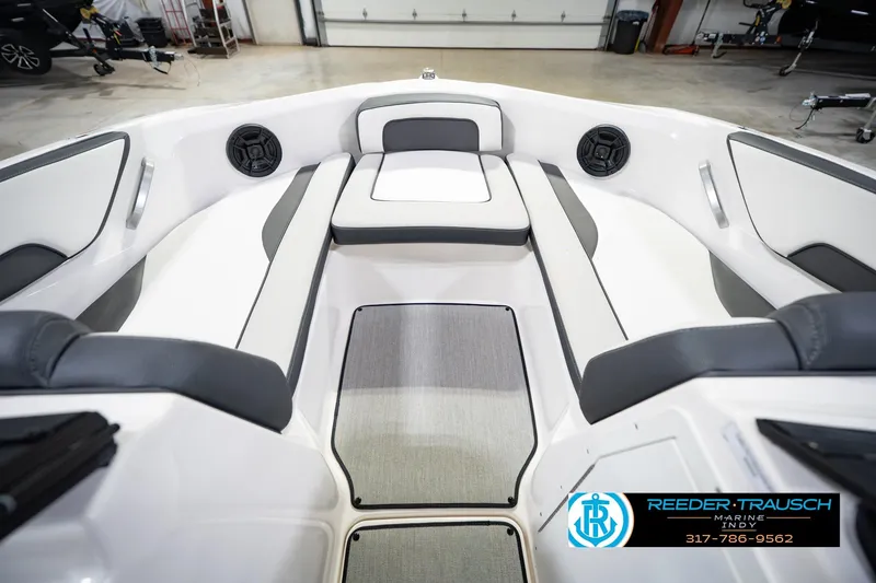 Slide: The Image of 2024 Yamaha Boats AR195 interior with sleek seating and modern design. - 24