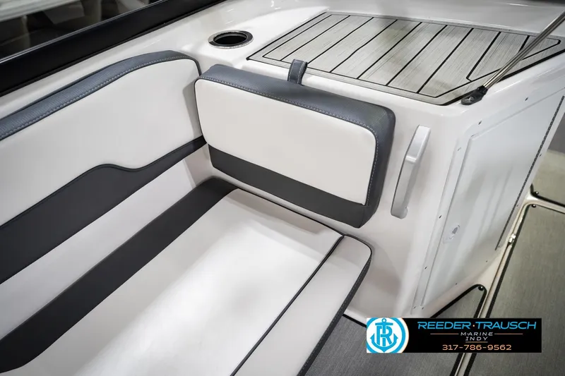 Slide: The Image of 2024 Yamaha AR195 boat interior with sleek seating and modern design. - 26