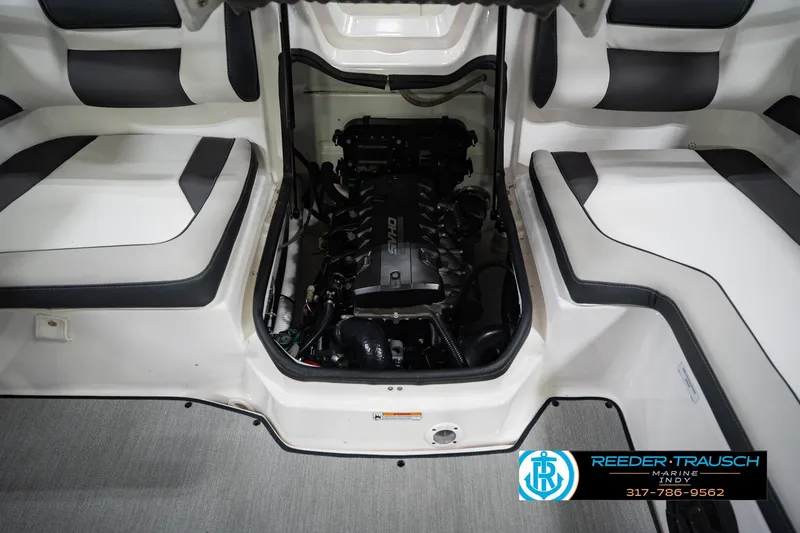 Slide: The Image of 2024 Yamaha AR195 boat engine compartment with seating, showcasing sleek interior design. - 29