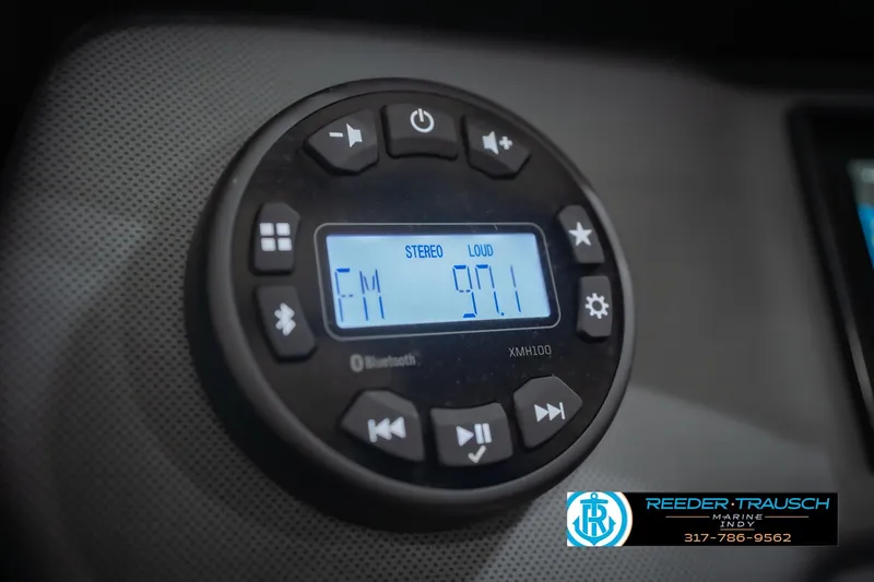 Slide: The Image of Close-up of Yamaha Boats AR195 2024 stereo system displaying FM 97.1. - 34