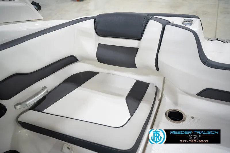 Slide: The Image of 2024 Yamaha AR195 boat interior seating with sleek black and white design. - 39