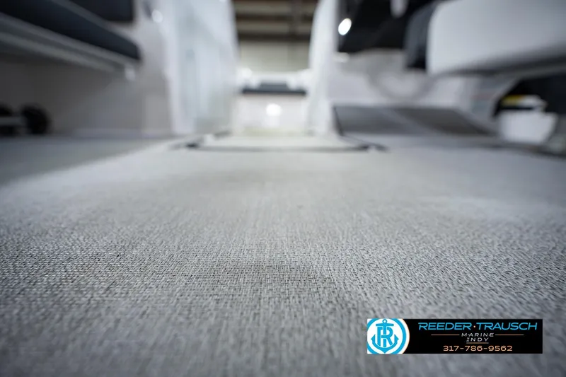 Slide: The Image of 2024 Yamaha Boats AR195 interior flooring, showcasing textured design and modern craftsmanship. - 45