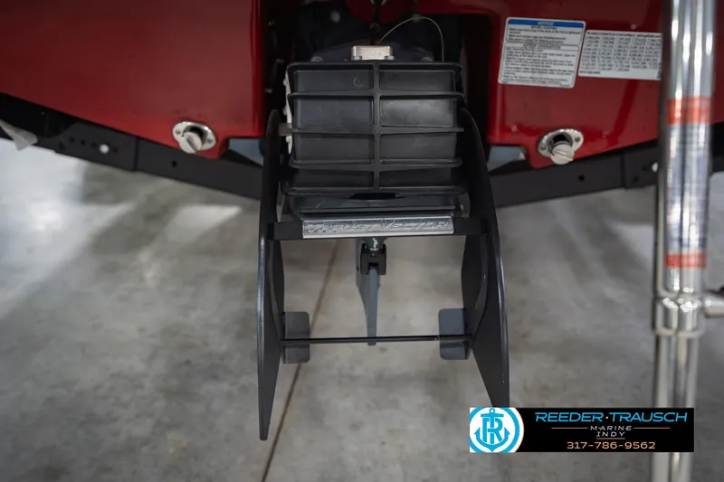 Slide: The Image of 2024 Yamaha AR195 boat rear view with jet propulsion system and dealership logo. - 48