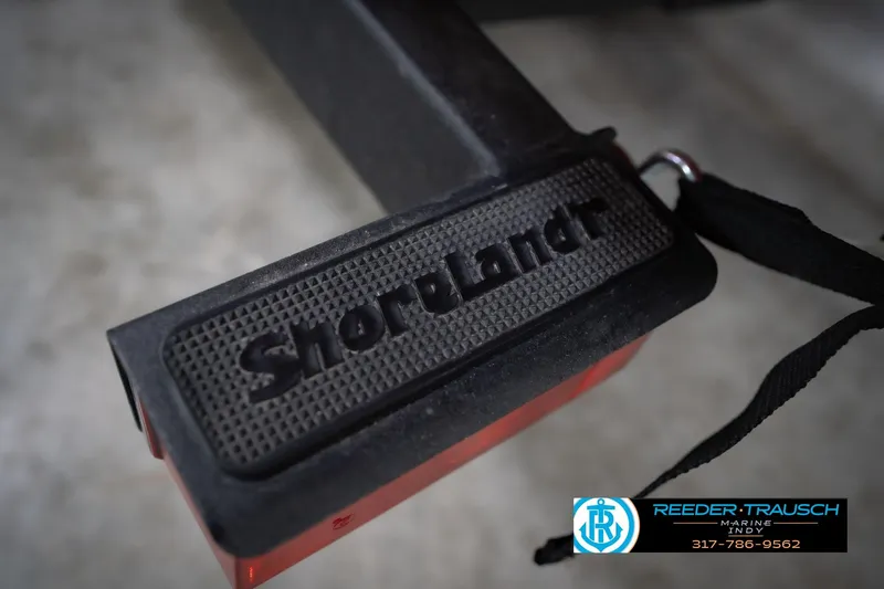 Slide: The Image of Close-up of ShoreLand'r trailer step for 2024 Yamaha Boats AR195. - 53