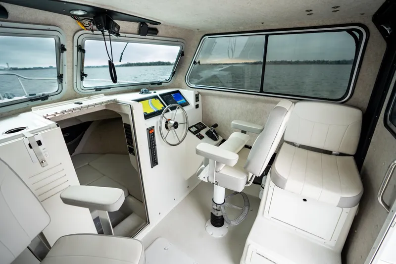 Slide: The Image of 2021 Parker 2520 XLD Sport Cabin interior with steering wheel and seating. - 37