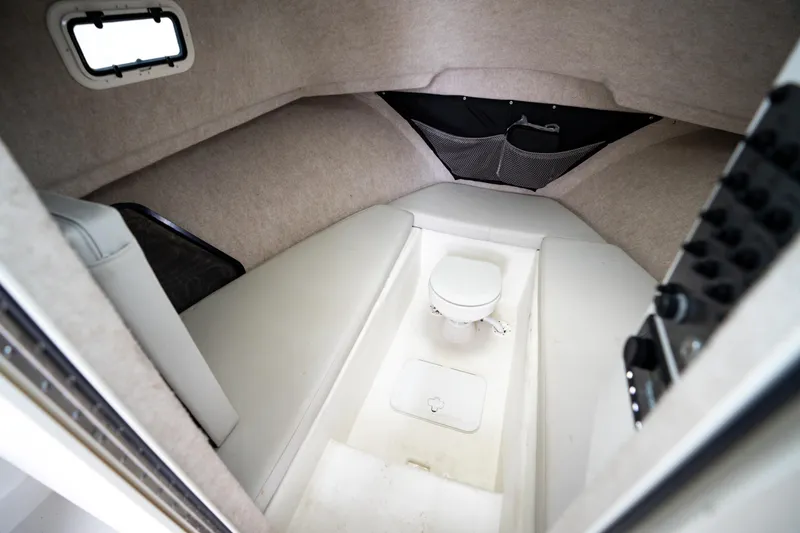 Slide: The Image of 2021 Parker 2520 XLD Sport Cabin interior with seating and compact toilet. - 39