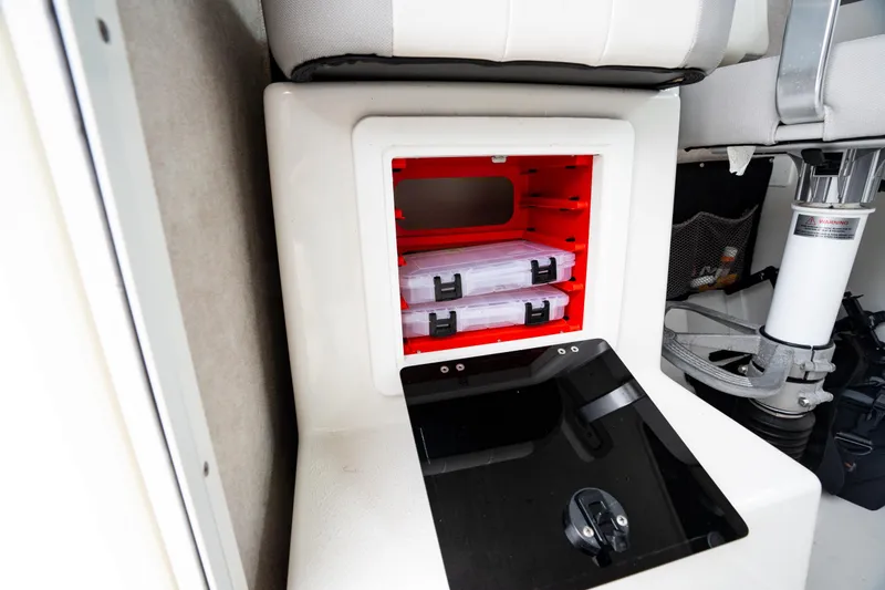 Slide: The Image of 2021 Parker 2520 XLD Sport Cabin interior storage with tackle boxes. - 42