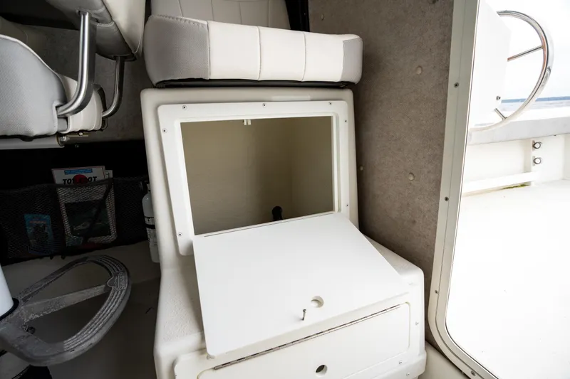 Slide: The Image of 2021 Parker 2520 XLD Sport Cabin interior storage compartment with open door. - 43