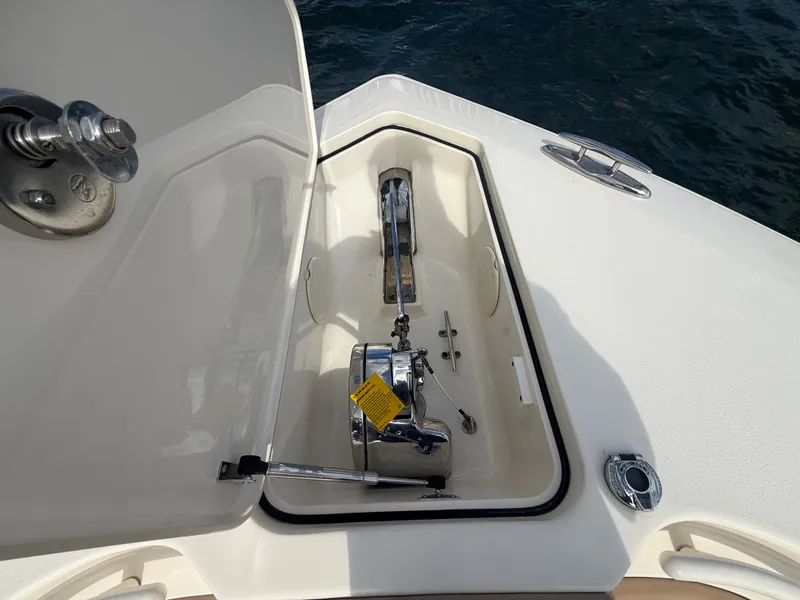 Slide: The Image of Anchor compartment of a 2017 Scout 320 LXF boat. - 10