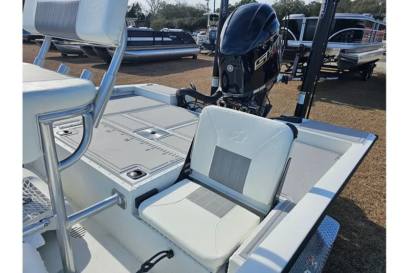 Slide: The Image of 2025 G3 Bay 19 GX boat with seating and powerful outboard motor. - 10