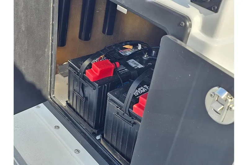 Slide: The Image of Battery compartment of 2025 G3 Bay 19 GX boat, featuring dual batteries. - 17